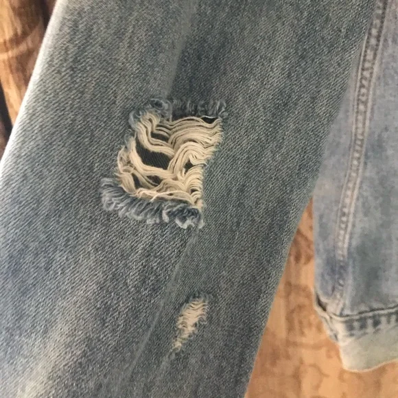 Distressed jean jacket, lots of rips and vintage looking. Comfy too - Picture 2 of 7